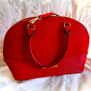 Red bag with polka dot interior